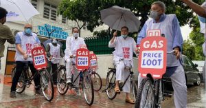 Trinamool MPs protest in front of the parliament by cycling