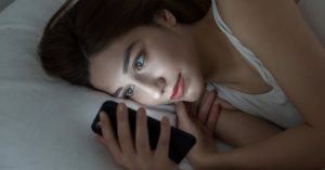 Young Woman Watching Movie