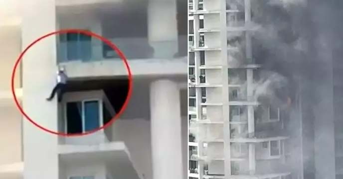 young man died after falling from a cornice in a devastating fire in Mumbai